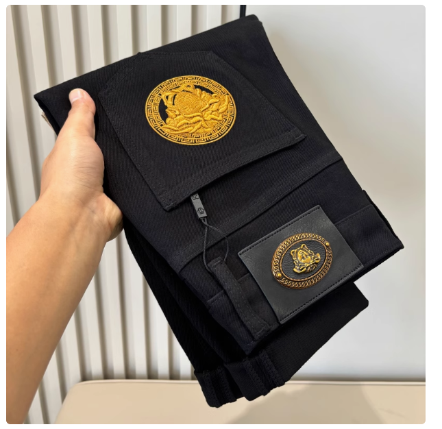 High-end lyocell pure black jeans for men Hong Kong trendy brand slim fit slim feet simple versatile stretch trousers