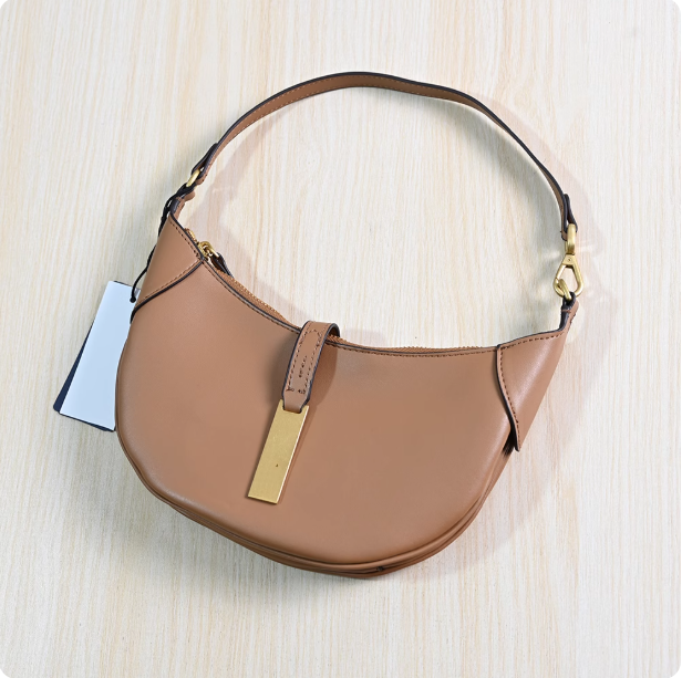 254/21 American single exquisite leather hollow metal piece one shoulder crossbody underarm saddle bag crescent bag