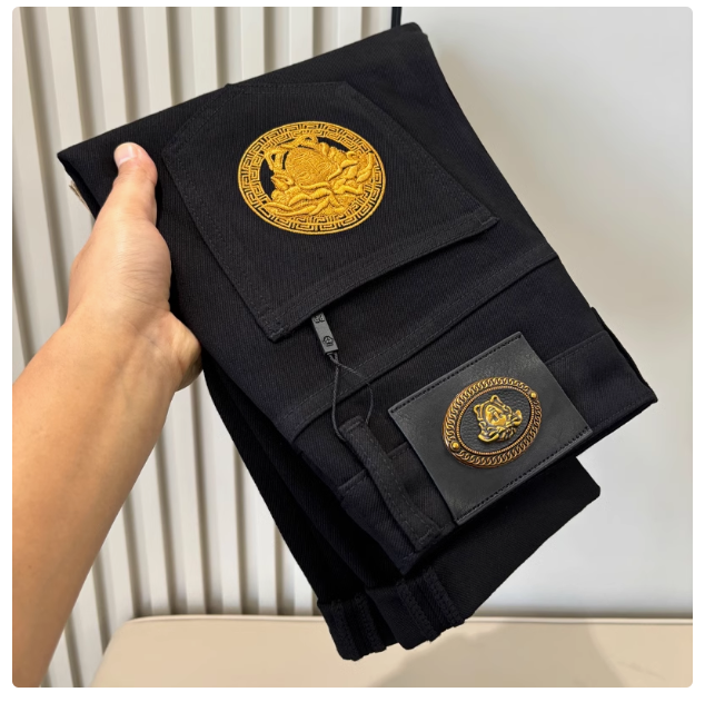 High-end lyocell pure black jeans for men Hong Kong trendy brand slim fit slim feet simple versatile stretch trousers