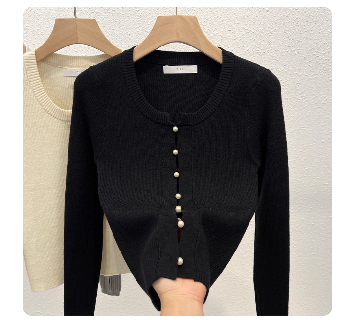 Unique and stylish long-sleeved knit top for women, perfect for spring and autumn. Korean style, slim fit, chic cutout short top.