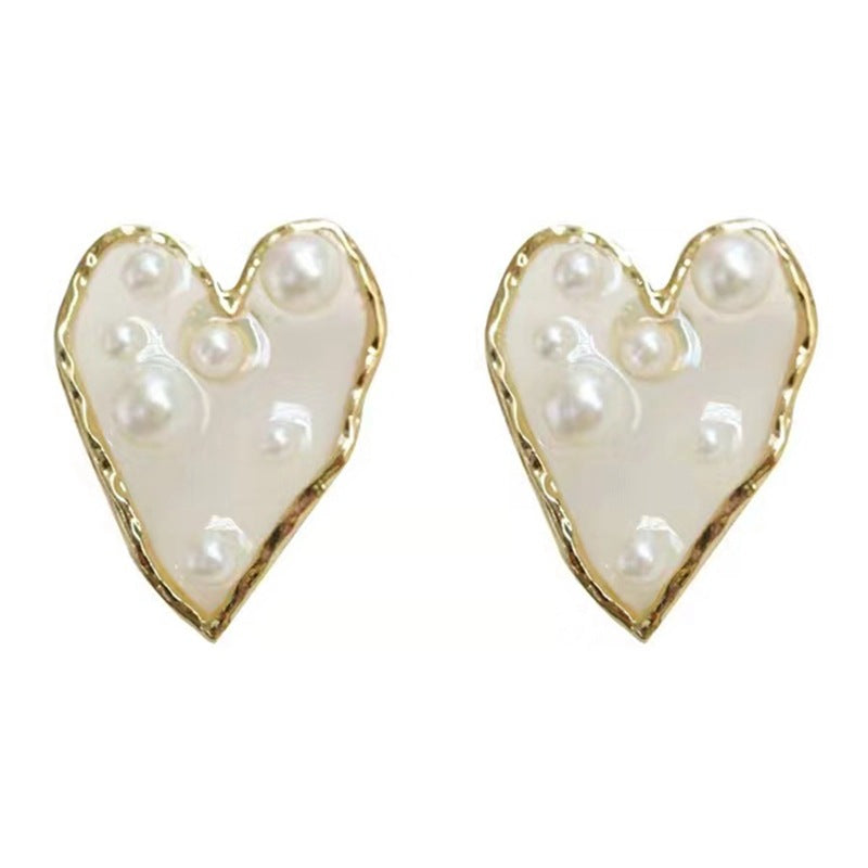Pearl geometric stud earrings