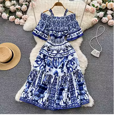 European and American summer new temperament off-the-shoulder suspender dress female elastic waist big swing print holiday wind dress