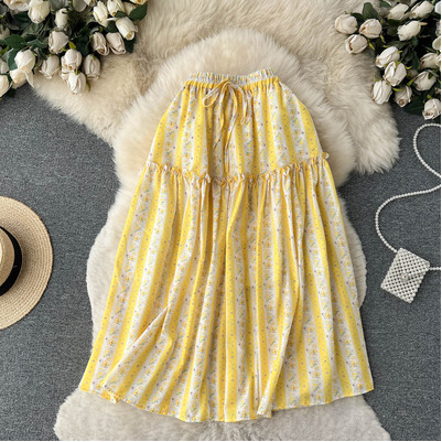 Korean chic2023 spring and summer new elastic waist wood ear stitching floral mid-length holiday skirt women