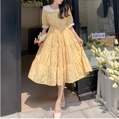 Spring and summer large size fresh and girlish yellow daisy doll collar sister loose slimming holiday dress