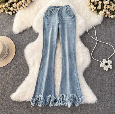 Autumn and winter new Korean version of high waist elastic thin tassel raw edge jeans casual micro flared trousers long trousers women