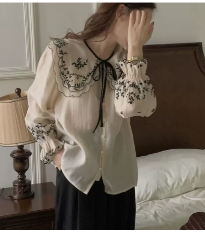 Retro embroidery doll collar long-sleeved shirt women 2022 spring and autumn new high-end shirt French fairy top