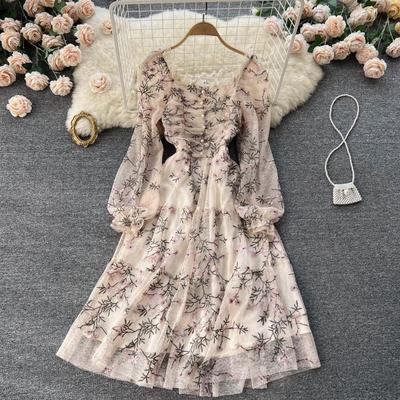 Design sense niche European and American embroidered dress female 2022 spring new pleated waist long-sleeved fairy skirt