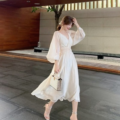 French retro temperament V-neck puff sleeve dress women's long-sleeved waist design sense niche holiday dress super fairy