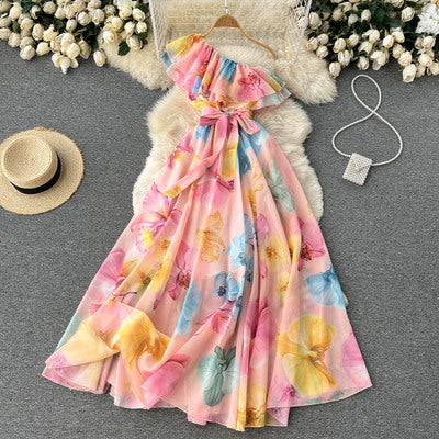 Summer new celebrity design sense irregular sloping shoulders chiffon floral dress temperament strap waist long skirt