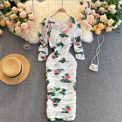 European and American retro rose print V-neck chest pad full body pleated goddess temperament sexy package hip midi dress