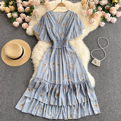 French dress 2022 new summer dress temperament V-neck elastic waist thin ruffled floral holiday skirt