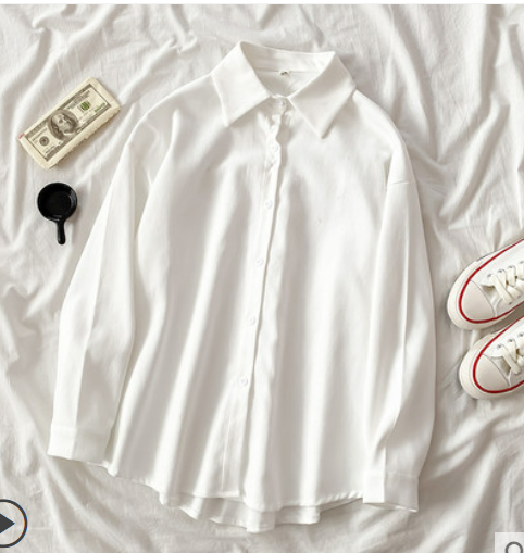 Design sense long-sleeved shirt autumn 2021 new women's Korean version of pure color niche loose mid-length white shirt