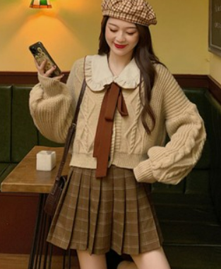 Autumn 2021 new style Korean fashion western style suit female sweet age reduction loose shirt sweater + plaid skirt